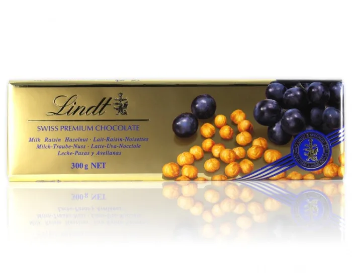 Шоколад Lindt молочный с лесным орехом и изюмом "Gold" 300 г